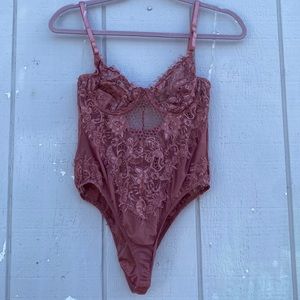 Cute lace mauve body suit